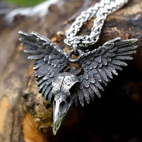 Men's dark-themed skull and wing pendant necklace