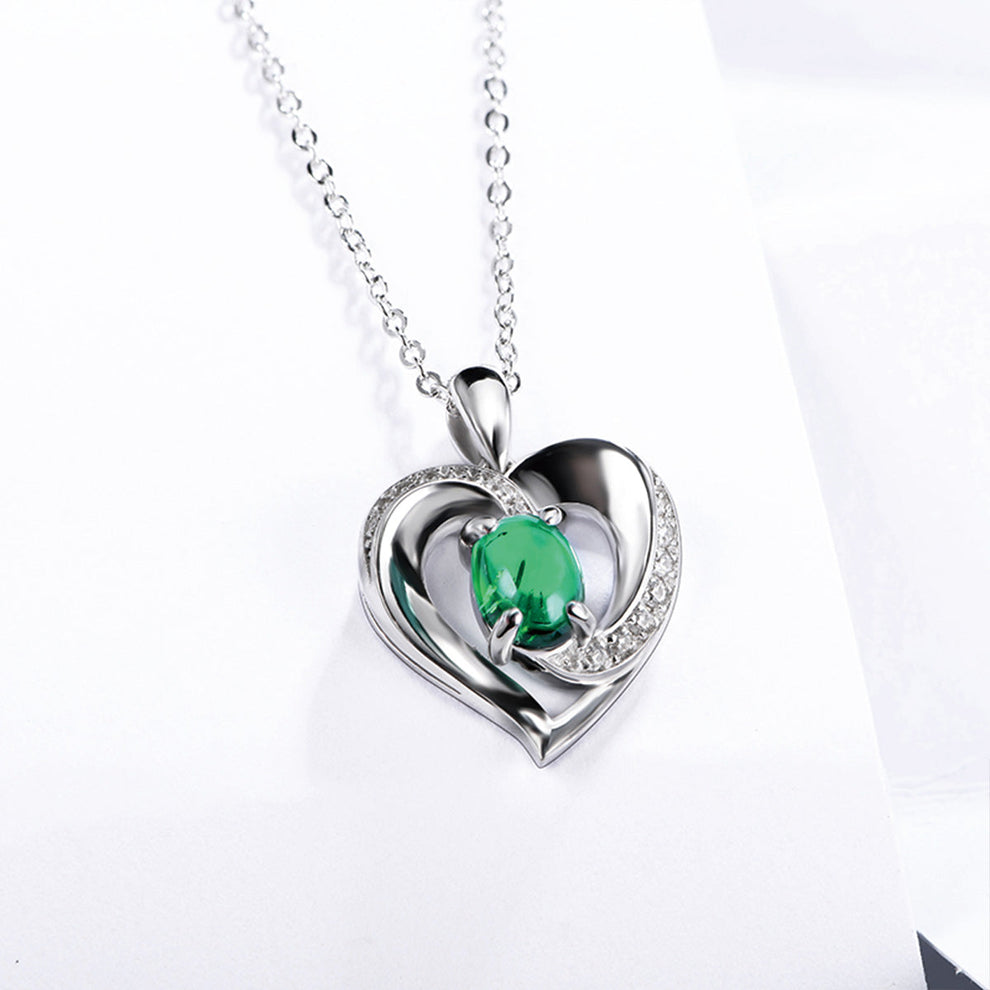 Women's Sterling Silver Channel Setting Hollow Heart Shape Pendant with Oval Brilliant Cut Emerald Gem