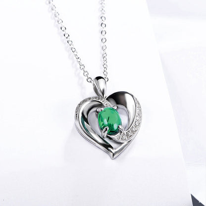 Women's Sterling Silver Channel Setting Hollow Heart Shape Pendant with Oval Brilliant Cut Emerald Gem