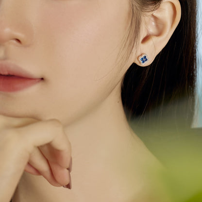 Womens Four‑Leaf Clover Stud Earrings, Round Blue Zirconia Center Stone With Paved Border, S925 with White Gold Plating