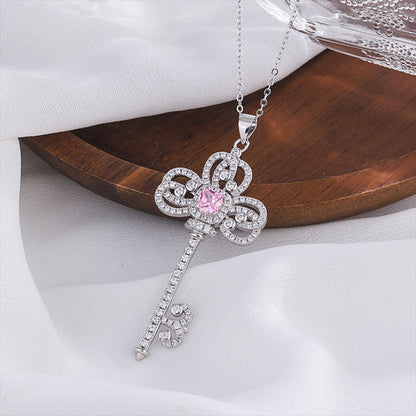 Women's White Gold Classic Iris Key Shape Pink Sapphire Pendant