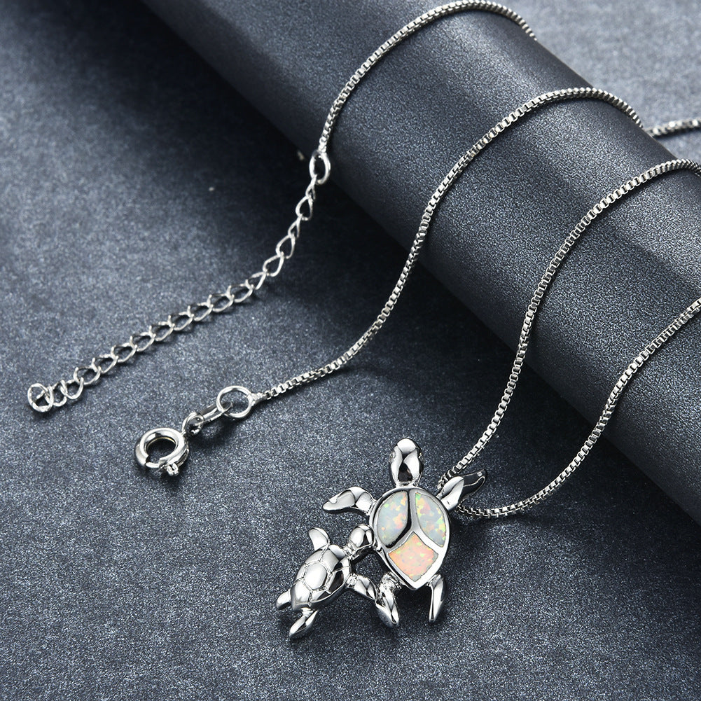 Opal Two turtle-shaped necklaces