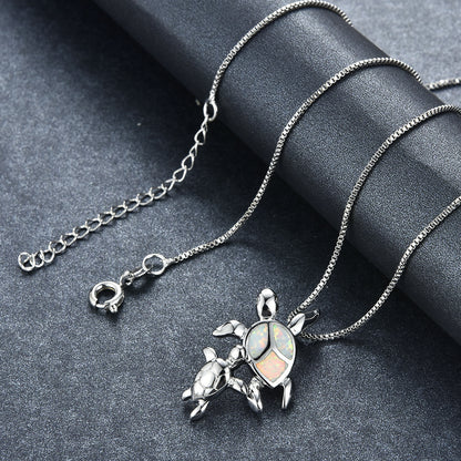Opal Two turtle-shaped necklaces