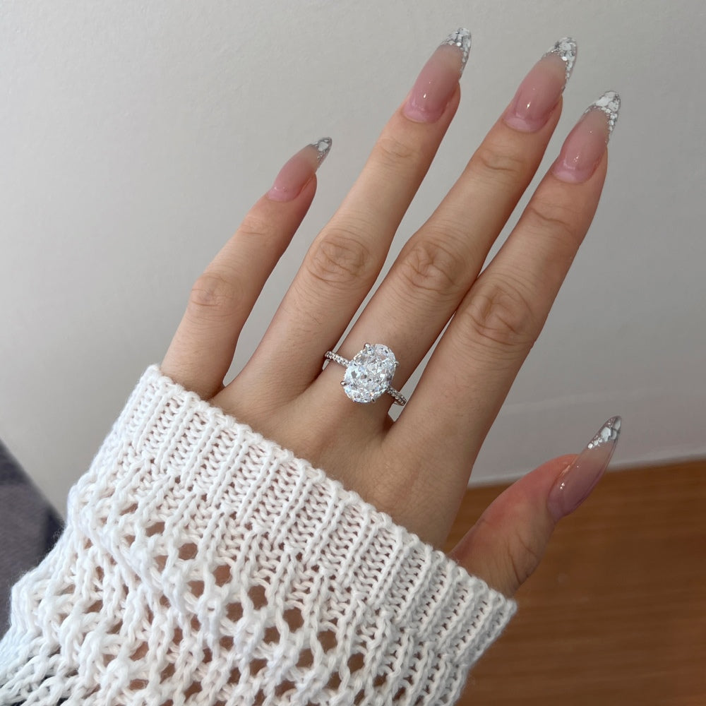 Women's Oval Egg Shape Claw Set Solitaire Zirconia Ring with Accent Side Stones, S925 with White Gold Plating