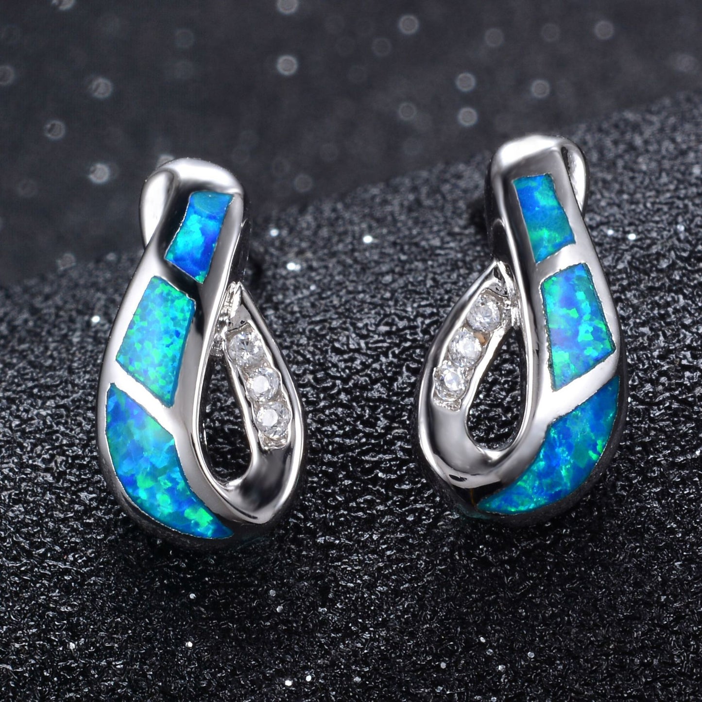 Women's Twisted Hollow Inlaid Blue Opal Stud Earrings With Zirconia Accents
