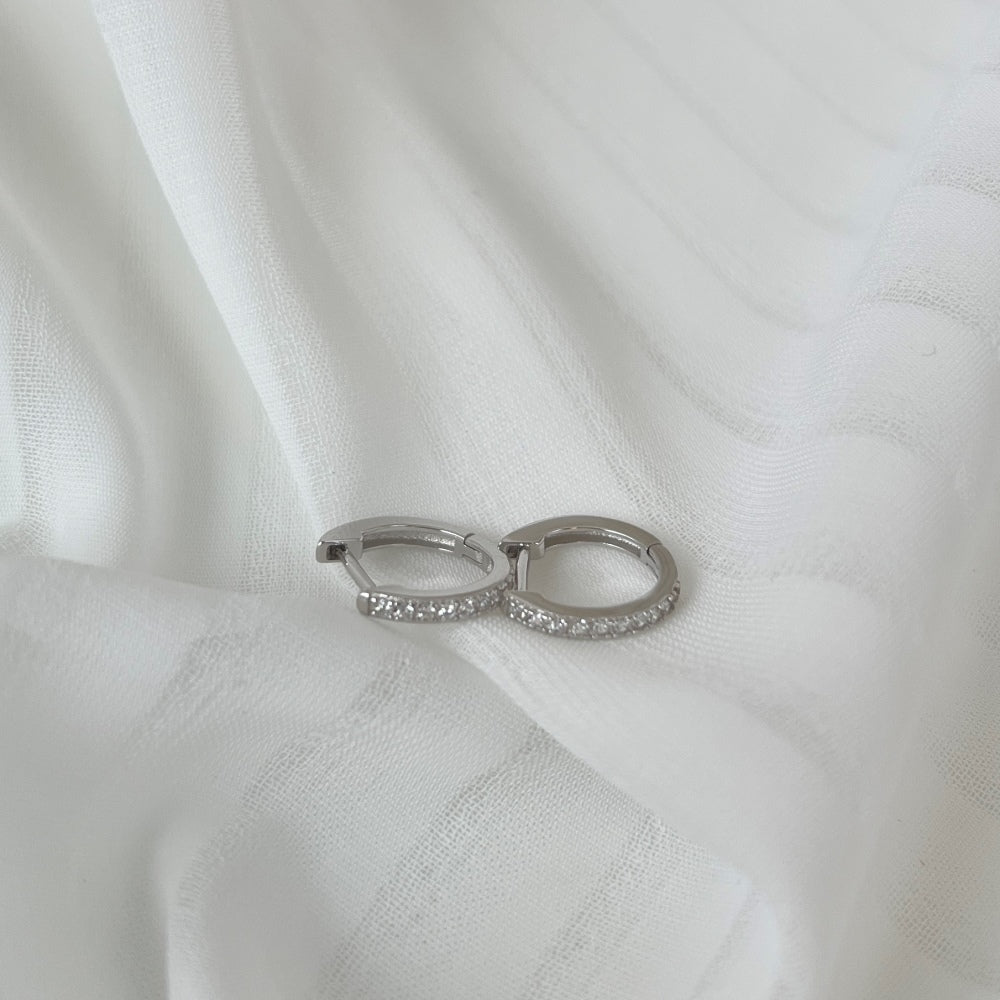 Women's Huggie Hoop Earrings, Half‑Pavé Round Zirconia, S925 with White Gold Plating