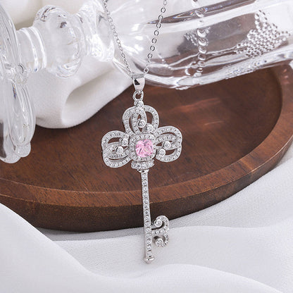 Women's White Gold Classic Iris Key Shape Pink Sapphire Pendant