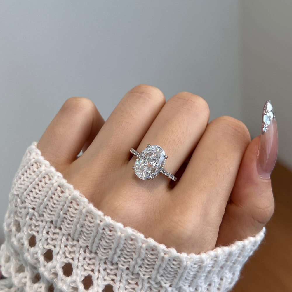 Women's Oval Egg Shape Claw Set Solitaire Zirconia Ring with Accent Side Stones, S925 with White Gold Plating