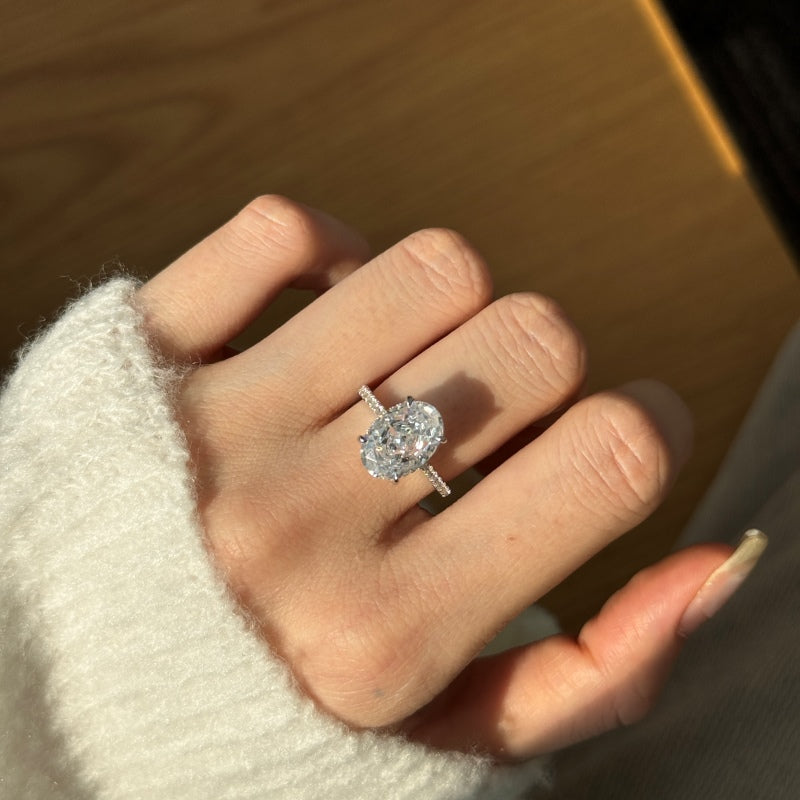 Women's Oval Egg Shape Claw Set Solitaire Zirconia Ring with Accent Side Stones, S925 with White Gold Plating