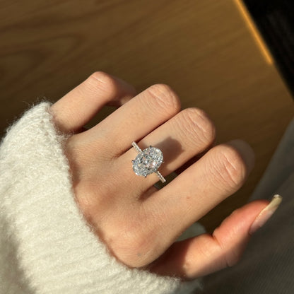 Women's Oval Egg Shape Claw Set Solitaire Zirconia Ring with Accent Side Stones, S925 with White Gold Plating