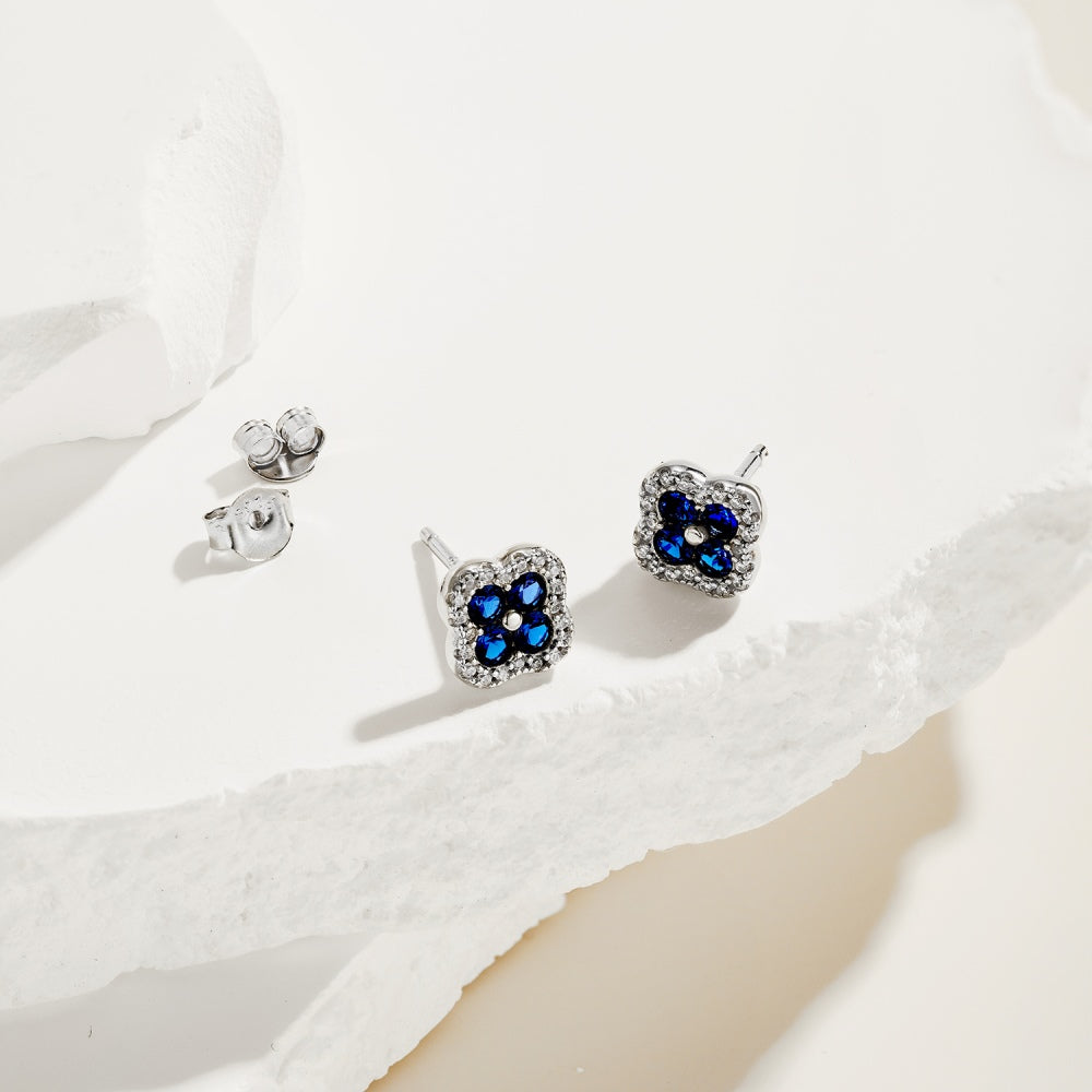 Womens Four‑Leaf Clover Stud Earrings, Round Blue Zirconia Center Stone With Paved Border, S925 with White Gold Plating